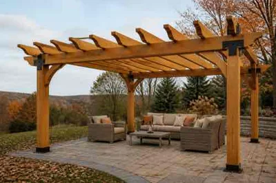 Handcrafted wooden pergola with secure metal hardware and clear post bases in late autumn