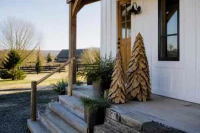 Handcrafted wood decor at a rural farmhouse entry