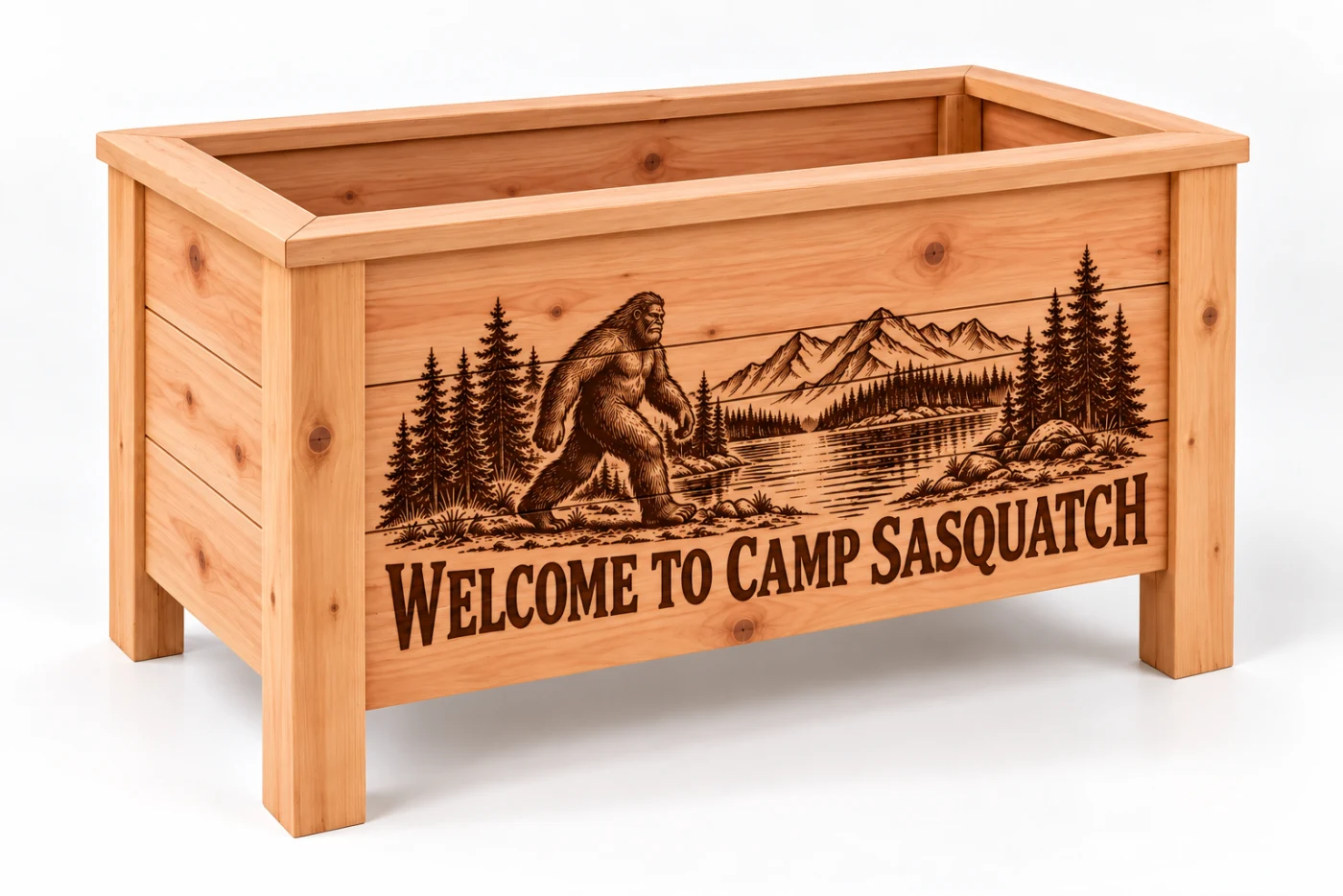 Sasquatch and mountain lake engraving on a large rectangular cedar planter
