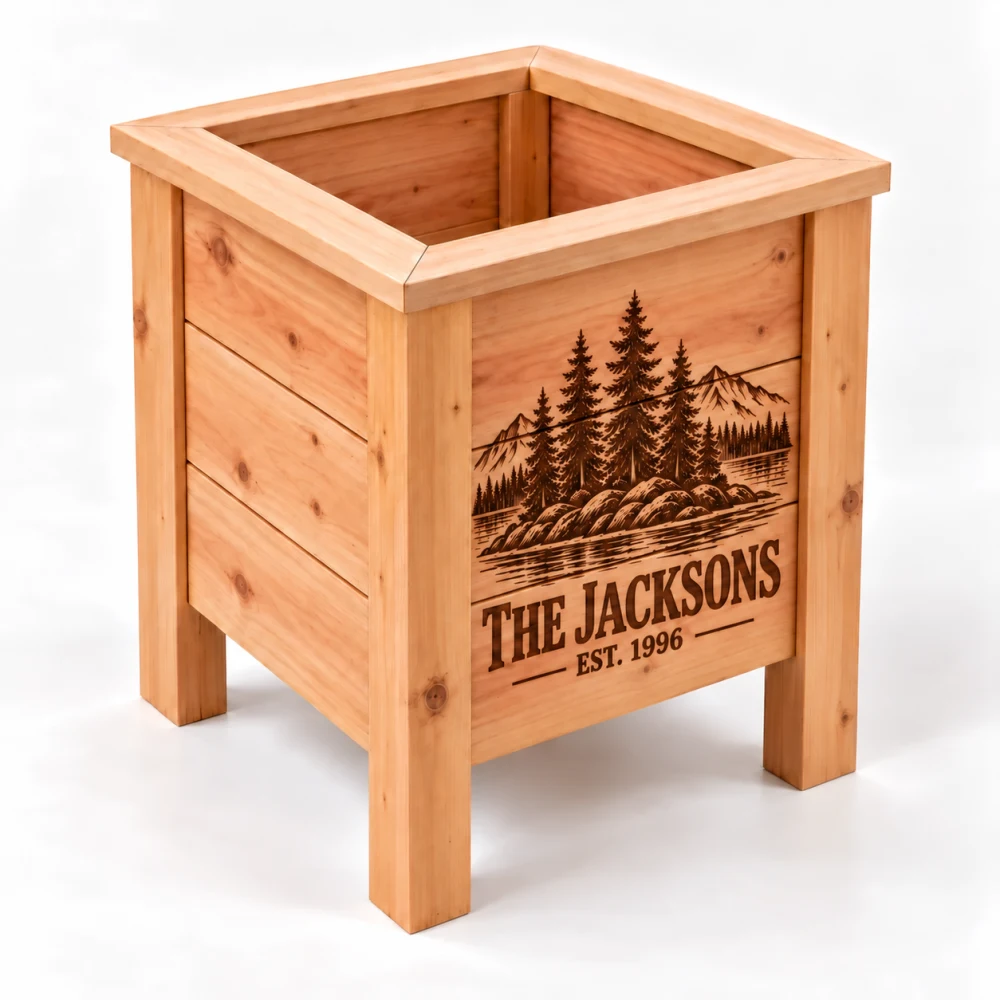 The Jacksons, established 1996, beneath a forest lake engraving on a large square cedar planter