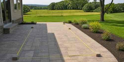 What Should You Check Before Building a Backyard Pergola? Measured pergola site on a rural backyard patio