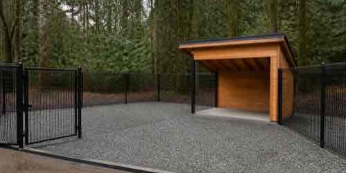 How Do You Prepare a Dog Kennel for Colder, Wetter Weather? Dog kennel prepared with dry covered shelter for wet weather