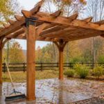 Pergola prepared for fall weather with secure drainage and hardware