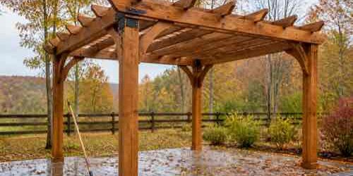 Pergola prepared for fall weather with secure drainage and hardware